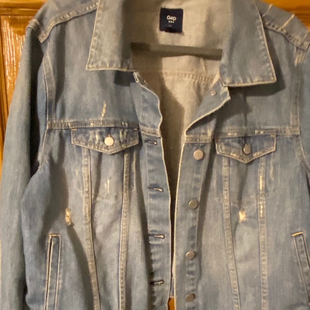 Women’s distressed jean jacket